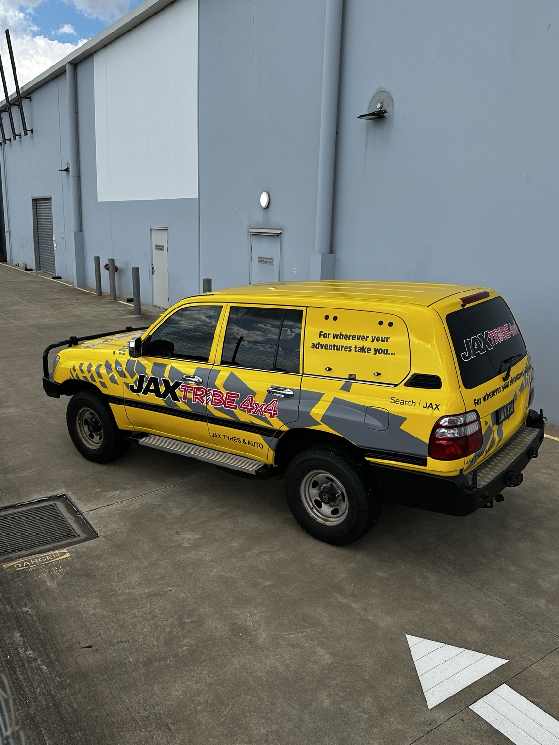 JAX 4X4 front view commercial wrap